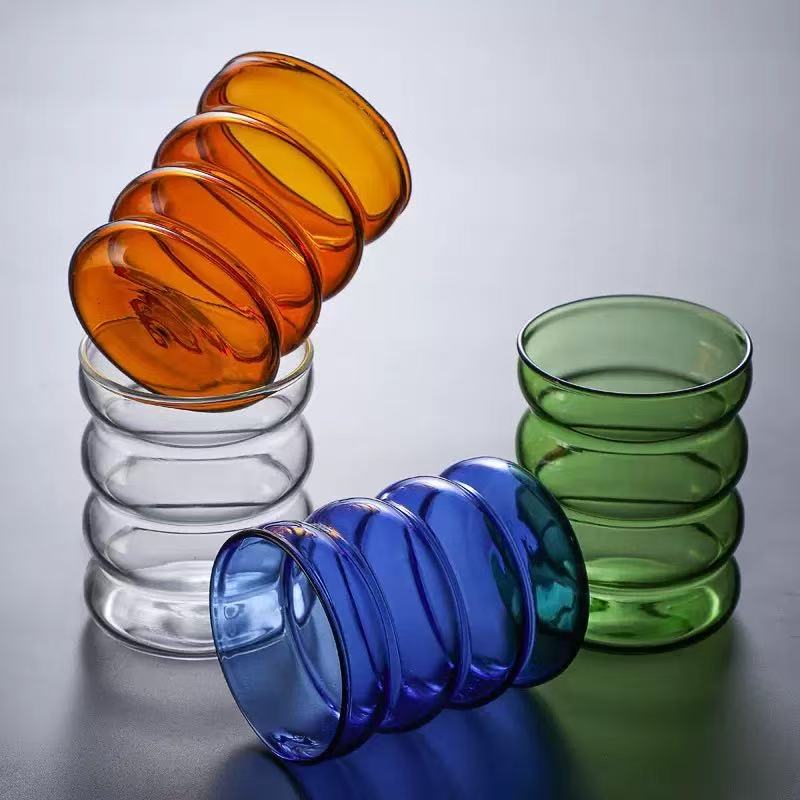 Artificially blown corrugated coloured glass