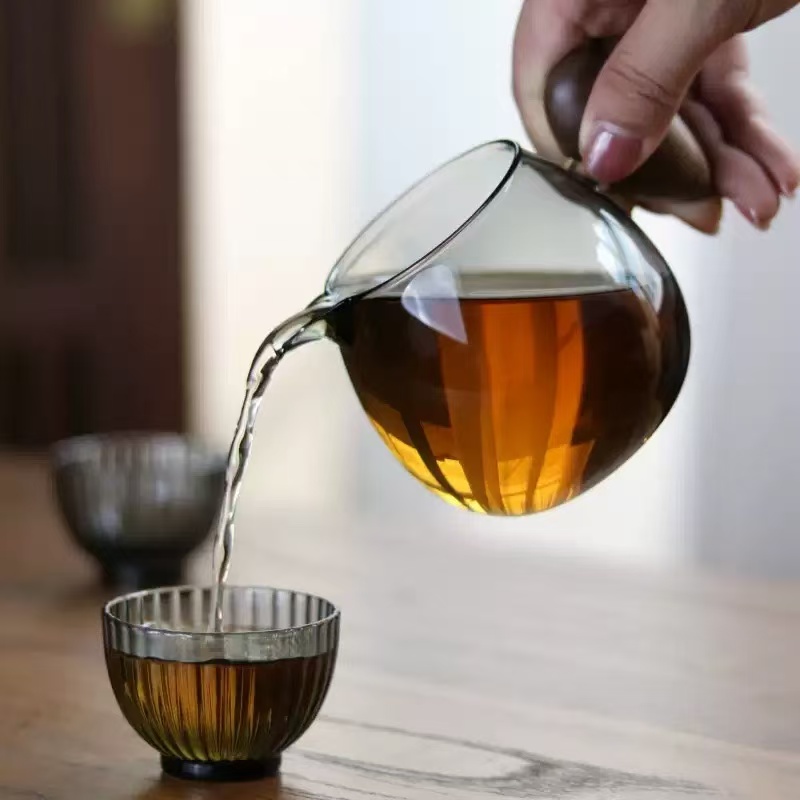 Small teapot with wooden handle